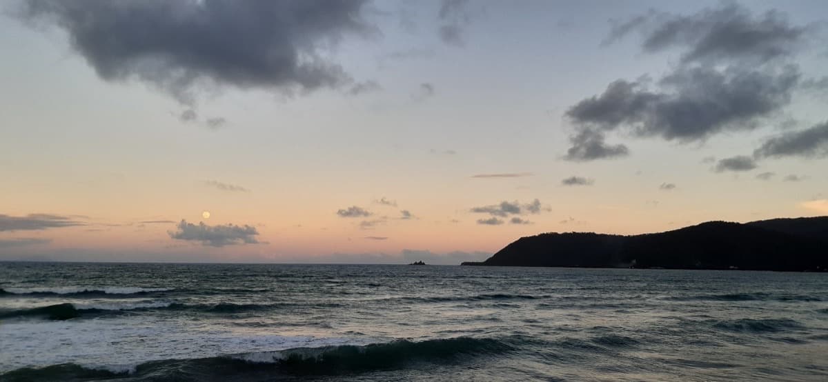 Surfing at Sabang Beach — event poster